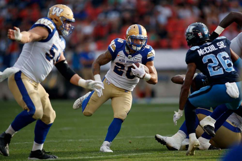 After an impressive performance in Week 1, running back Brady Oliveira has been shut down. It’s not clear when No. 1 Andrew Harris will return. (Cole Burston / The Canadian Press files)
