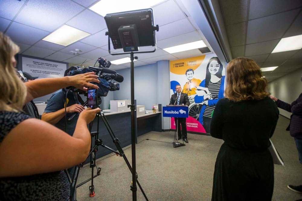 Advanced Education Minister Wayne Ewasko announces the resumption of in-person student aid services in the Robert Fletcher Building on Portage Avenue Wednesday. (Mikaela MacKenzie / Winnipeg Free Press)