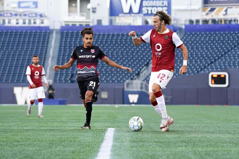 Rafael Galhardo handles to ball Saturday during Valour FC's match against Cavlary FC at IG Field. (Robert Reyes Ong / Valour FC)