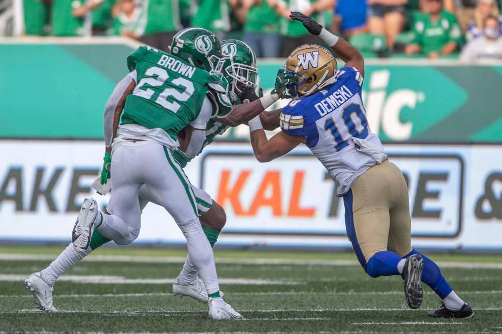 Blue Bombers slotback Nic Demski (right) made up for what he felt was a down week in the Labour Day Classic with fove receptions for 134 receiving yard in the Banjo Bowl. (Kayle Neis / The Canadian Press files)