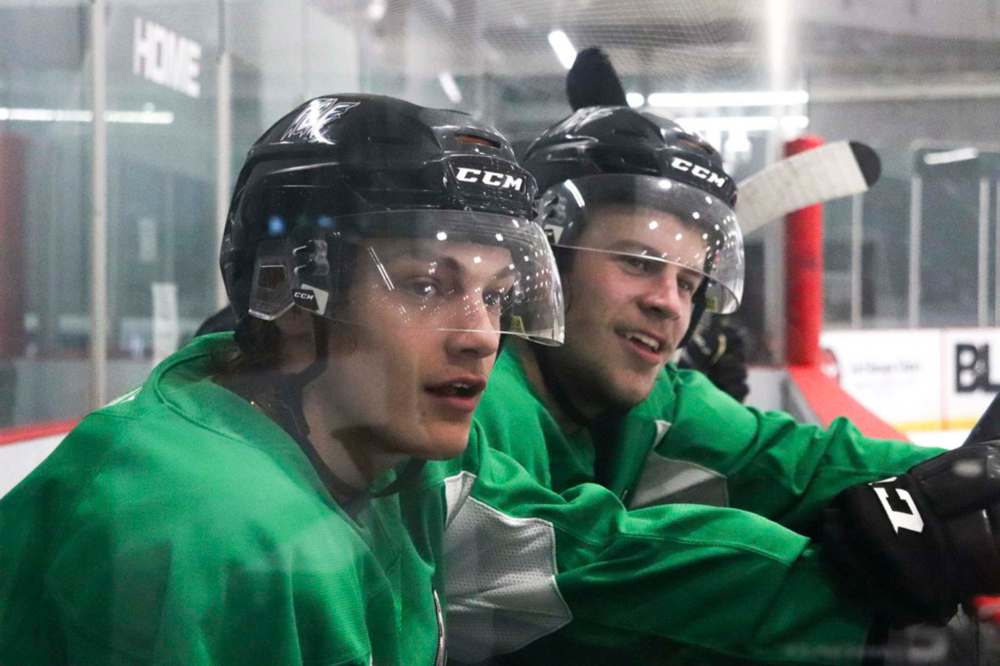 LUCAS HRYNK / 50 BELOW SPORTS
Skyler Bruce (left) and Owen Pederson at Winnipeg ICE practice, Tuesday.