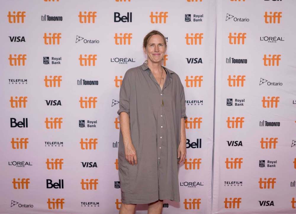 Author Miriam Toews poses for a photograph on the red carpet premiere for the film “All My Puny Sorrows” at the Princess of Wales Theatre during the 2021 Toronto International Film Festival, in Toronto, Saturday, Sept. 11, 2021. THE CANADIAN PRESS/Tijana Martin