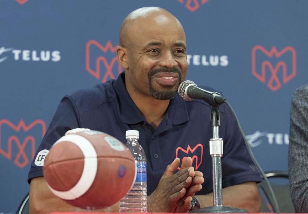 Alouettes head coach Khari Jones will miss Saturday’s game against the B.C. Lions. THE CANADIAN PRESS/Graham Hughes