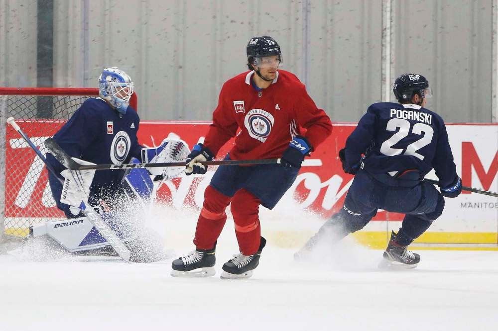 Moose head coach Mark Morrison will likely have the services of defenceman Johnathan Kovacevic this season. (John Woods / Winnipeg Free Press)