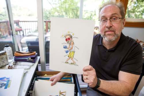 MIKE DEAL / WINNIPEG FREE PRESS
Chris Chuckry is used to working with heroes and villains in major comic books, but last year he turned his pen toward the people filling those roles in provincial politics.