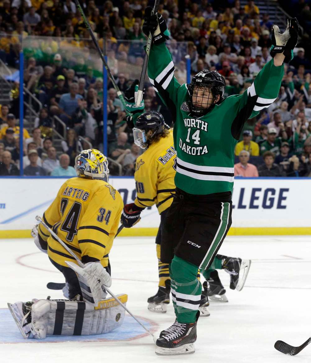 Forward Austin Poganski playing for North Dakota in the NCAA Frozen Four championship in 2016. (AP Photo/Chris O'Meara)