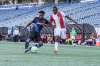 Valour FC's William Akio (right) and FC Edmonton's Saah Fayia challenge for the ball Saturday in Winnipeg. (Robert Reyes Ong / Valour FC)