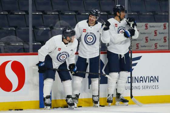 JOHN WOODS / WINNIPEG FREE PRESSWinnipeg Jets' Nikolaj Ehlers, Mark Scheifele and Blake Wheeler at practice in Winnipeg on Monday. The Jets' key core players are currently in their prime and are in win-now mode.