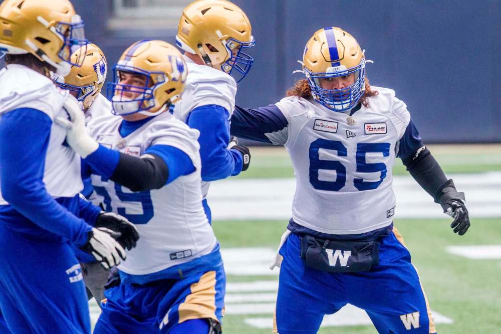 The Bombers are confident offensive lineman Asotui Eli (right) can fill in if Jermarcus Hardrick isn't able to play Friday against the Elks in Edmonton. (Mikaela MacKenzie / Winnipeg Free Press)