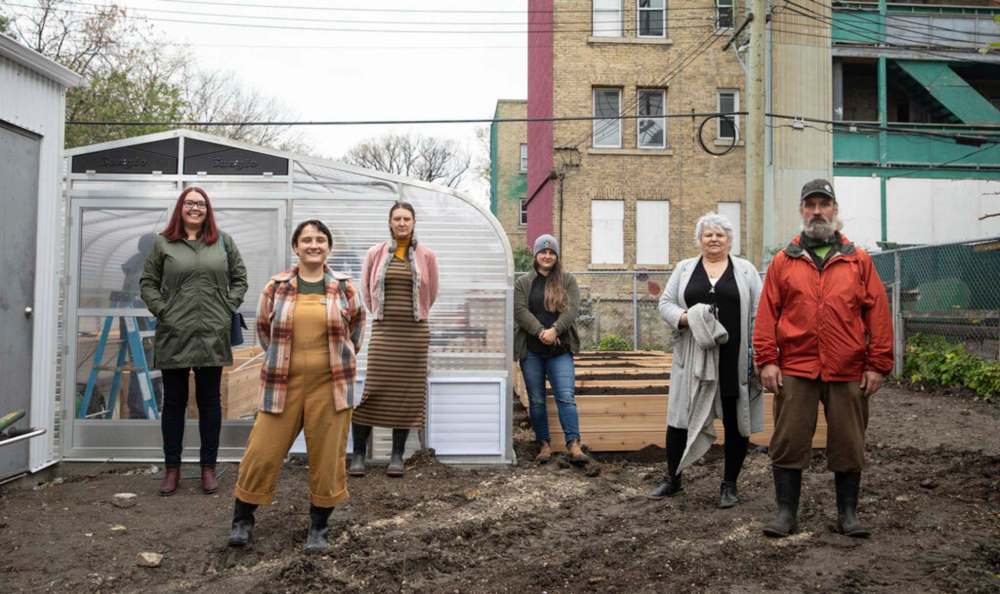 JESSICA LEE / WINNIPEG FREE PRESS
Spence Neighbourhood Association at the soft opening of their InnerCity Community Greenhouse Wednesday. From left to right: Kelly Romas, Director of Marketing Red River Co-op; Mandalyn Unger, Environmental and Open Spaces Coordinator at Spence Neighbourhood Association; Olivia Michalczuk, Director of Grants at Spence Neighbourhood Association; Lin Howes Barr, Executive Director at Spence Neighbourhood Association; Jocelyn Macleod, Building Sustainable Communities Program, Provincial Government; and Stephen Kirk, Greenhouse Coordinator.
