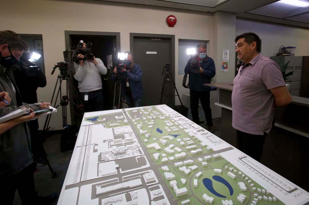 David Thomas, planning and design manager of Treaty One Development Corp., unveiled a model of Naawi-Oodena being built on the site of the former Kapyong barracks. (Shannon VanRaes / Winnipeg Free Press)