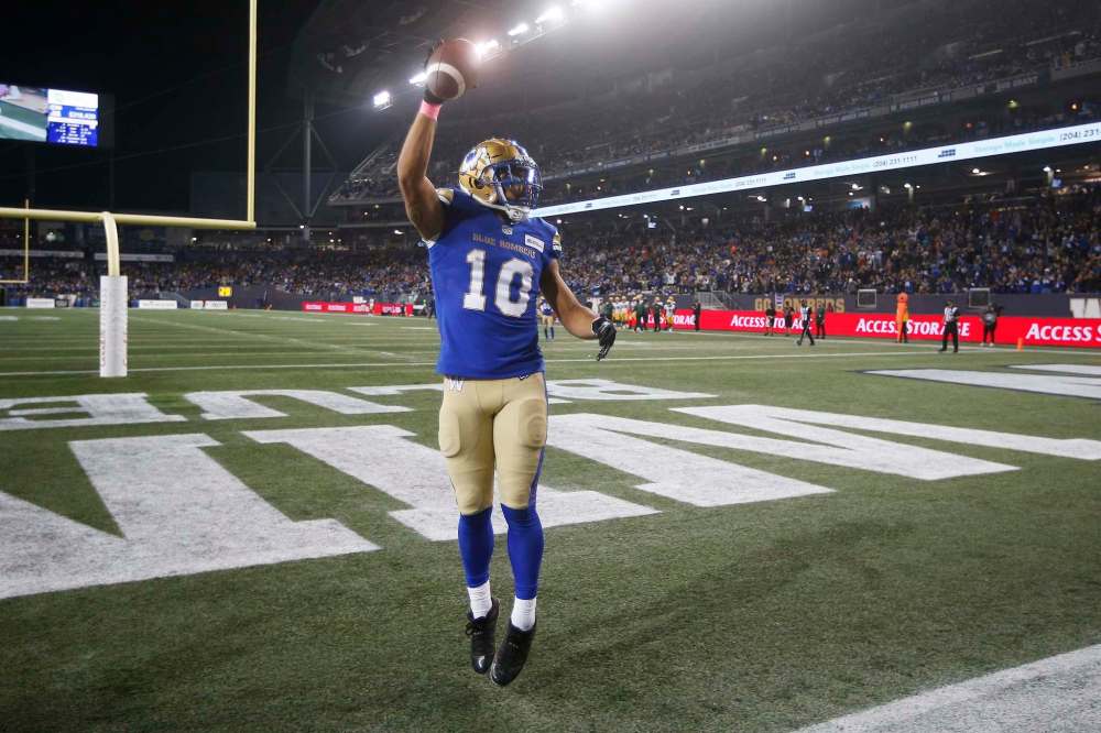 Nic Demski celebrates his touchdown against the Edmonton Elks on Oct. 8. If the Bombers win Friday they are in the playoffs. (John Woods / The Canadian Press files)