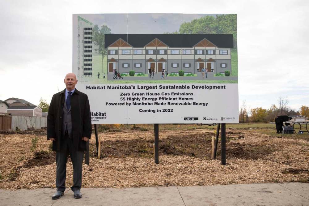On Friday morning, officials with Habitat for Humanity and a handful of local politicians turned the sod on a 55-unit townhouse development on the 900 block of Pandora Avenue West. (JESSICA LEE / WINNIPEG FREE PRESS)
