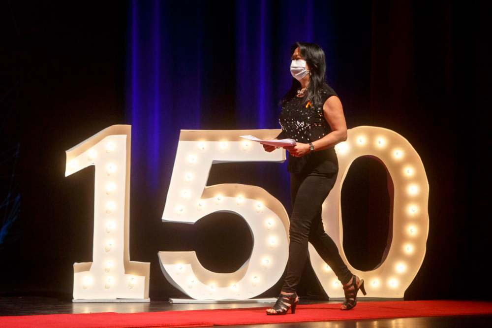 Joyce Wong, Tec Voc vice-principal, steps on stage during the Winnipeg School Division 150 celebration. (Mike Deal / Winnipeg Free Press)