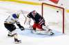 St. Louis Blues’ Ryan O’Reilly scores in the shootout on Winnipeg Jets goaltender Connor Hellebuyck during NHL action in Winnipeg on Tuesday. THE CANADIAN PRESS/Fred Greenslade