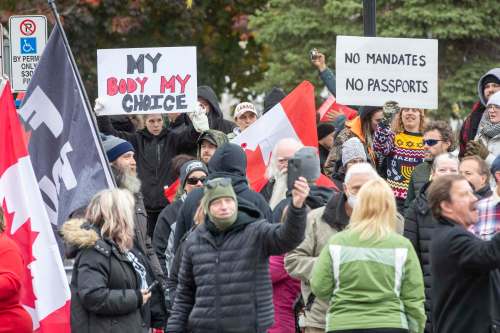 Lars Hagberg / The Canadian Press
An anti-vaccine protest Sunday in Kingston, Ont.: reaching out to deniers and those who identify as evangelical should start with acknowledging their fears, then trying to counter them, an expert says.