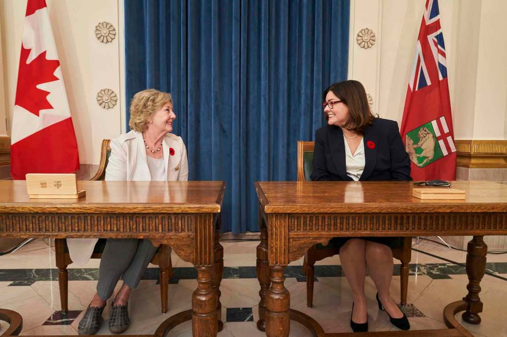 Heather Stefanson (right) is sworn in as Manitoba's 24th premier by Lt.-Gov. Janice Filmon on Nov. 2. (David Lipnowski / The Canadian Press files)
