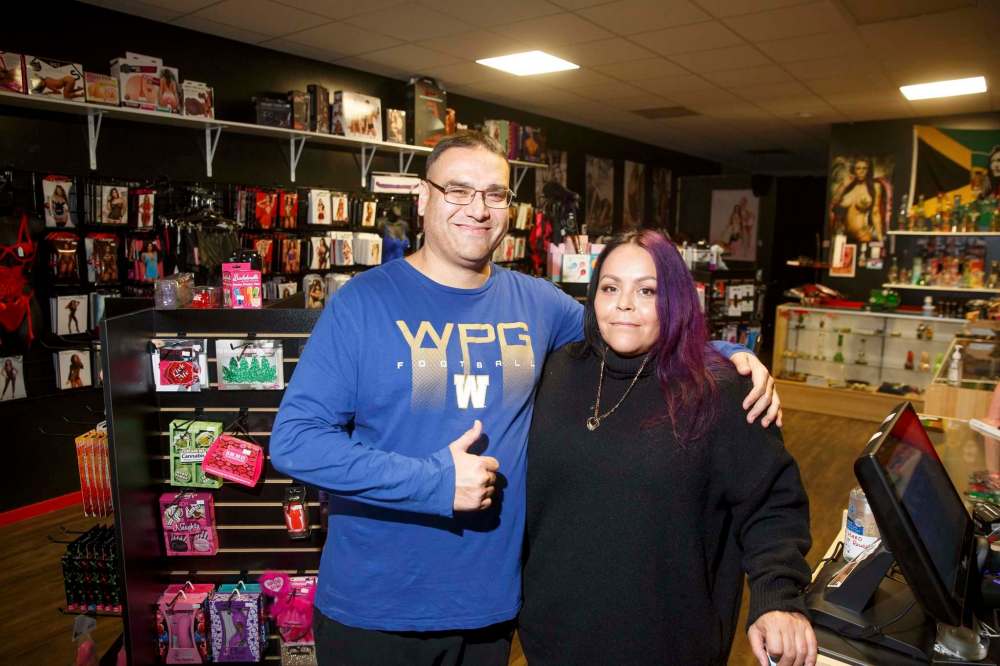 Owners Dustin Morrisseau and wife Rhiannon are about to celebrate the first anniversary of their store, Dongs, Thongs and Bongs. Neither owner imagined they’d be selling sex toys and pot paraphernalia. (Mike Deal / Winnipeg Free Press)