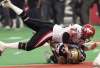 Shaun Best / REUTERS
Calgary Stampeders defensive tackle Joe Fleming (76) sacks quarterback Winnipeg Blue Bombers Khari Jones in the final play of the 89th Grey Cup in Montreal’s Olympic Stadium November 25, 2001. The Stampeders beat the Bombers 27-19.