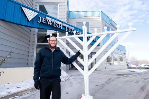 Mike Sudoma / Winnipeg Free Press
Rabbi Boruch Heidingsfeld shows off a wooden menorah which will be strapped into the back of a truck to use for the Chabad-Lubavitch Jewish Learning Centre&rsquo;s mobile menorah service, which runs from Nov. 28 until Dec. 6.