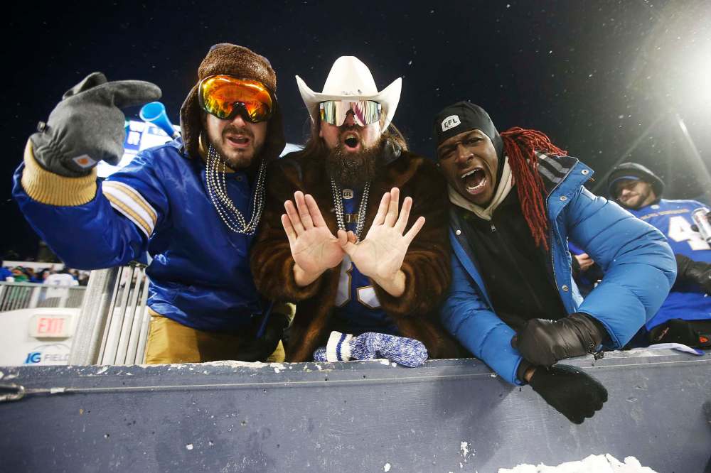 Fans were in the mood to celebrate after being Saskatchewan on Sunday. (John Woods / The Canadian Press)