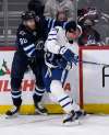 Fred Greenslade / The Canadian Press
Pierre-Luc Dubois (left) tangles with Leafs forward Auston Matthews.