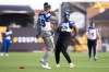 Bombers players such as Kenny Lawler (left) and Alden Darby were loose and relaxed Saturday during practice, but they'll be all business when game time comes around. (Nick Iwanyshyn / The Canadian Press)