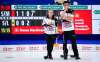 Kadriana Sahaidak and Colton Lott discuss strategy as they play at the Canadian Mixed Doubles Curling Championship in Calgary, Alta., in March. Lott says he'd like to believe the Gimli-area duo will be in the conversation for selection as Curling Canada's hand-picked Olympic entry. (JEFF MCINTOSH/THE CANADIAN PRESS)