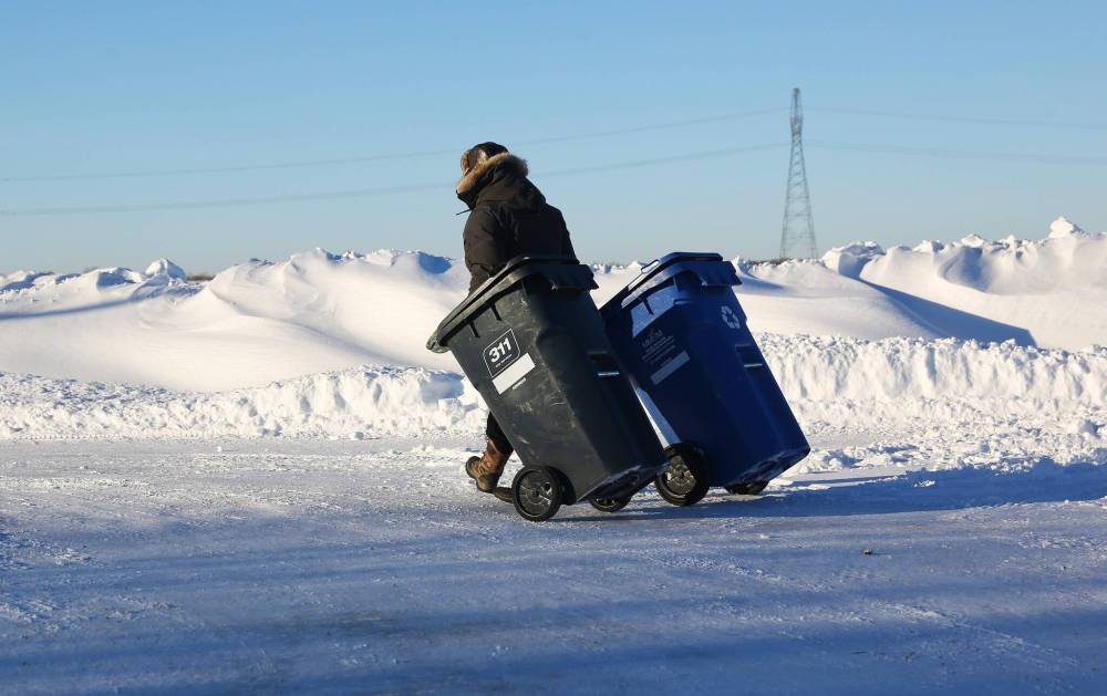 MIKE DEAL / WINNIPEG FREE PRESS
On some stretches of Winnipeg roads and sidewalks, it appears that as soon as city plows clear the snow away, wind blows it right back in.