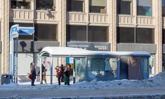MIKE DEAL / WINNIPEG FREE PRESSWinnipeg police arrested a 38-year-old man after a passerby saw him sexually assaulting a woman in her 50s inside this bus shelter at Garry Street and Portage Avenue on Friday evening.