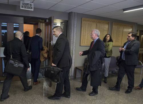 Andrew Vaughan / The Canadian Press files
In this 2019 photo, interested parties file into the Nova Scotia Supreme Court as Canada’s largest cryptocurrency exchange, Vancouver-based Quadriga, sought creditor protection in the wake of the sudden death of founder and chief executive Gerald Cotten.