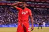 Canada’s Jonathan David celebrates scored his side’s second goal against Honduras during a qualifying soccer match for the FIFA World Cup Qatar 2022 in San Pedro Sula, Honduras, Thursday. (AP Photo/Delmer Martinez)