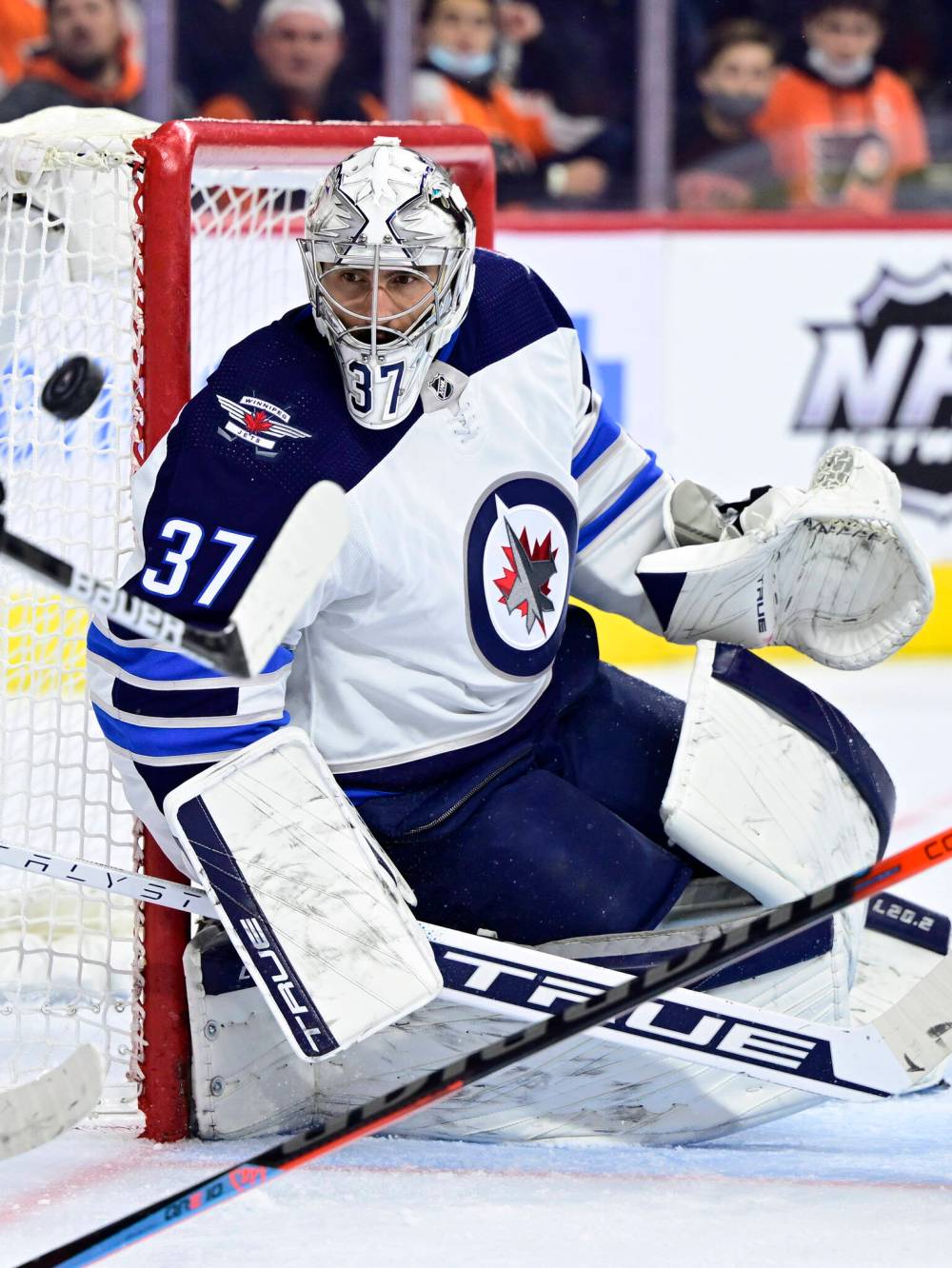 Winnipeg Jets goaltender Connor Hellebuyck watches the puck after making a save during the second period. (AP Photo/Derik Hamilton)