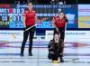 Wild Card 1 skip Tracy Fleury watches a rock as Team Canada lead Briane Meilleur (left) and second Shannon Birchard look on Saturday in Thunder Bay, Ont. (Andrew Vaughan / The Canadian Press)