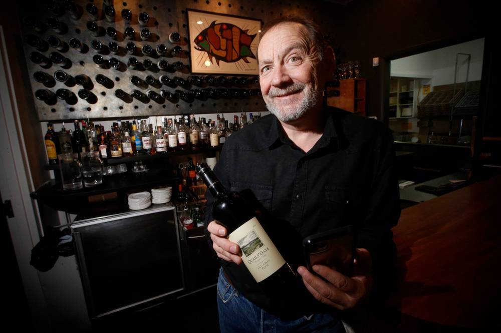 Scot McTaggart, owner of Fusion Grill on Academy Road, can suggest just the right wine. (John Woods / Winnipeg Free Press files)