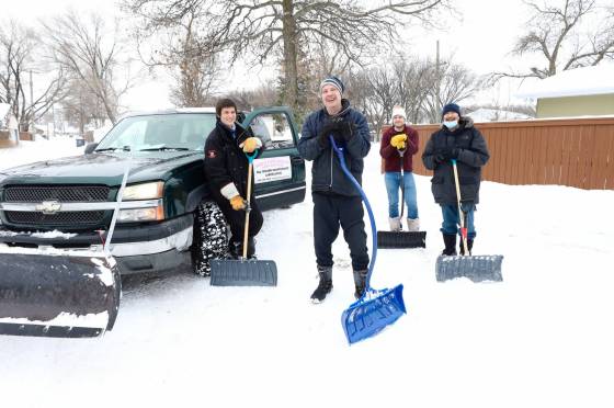 RUTH BONNEVILLE / WINNIPEG FREE PRESSMark’s Lawn Care and Snow Removal Service owner Mark Riddell (centre) and employees Russell Sand (left), Jeff Nikell (rear), and Robbie Antsanen (right).