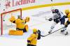 Jets captain Blake Wheeler scores a power-play goal against Nashville Predators goaltender Juuse Saros Saturday night in Nashville. (Mark Zaleski / The Associated Press)