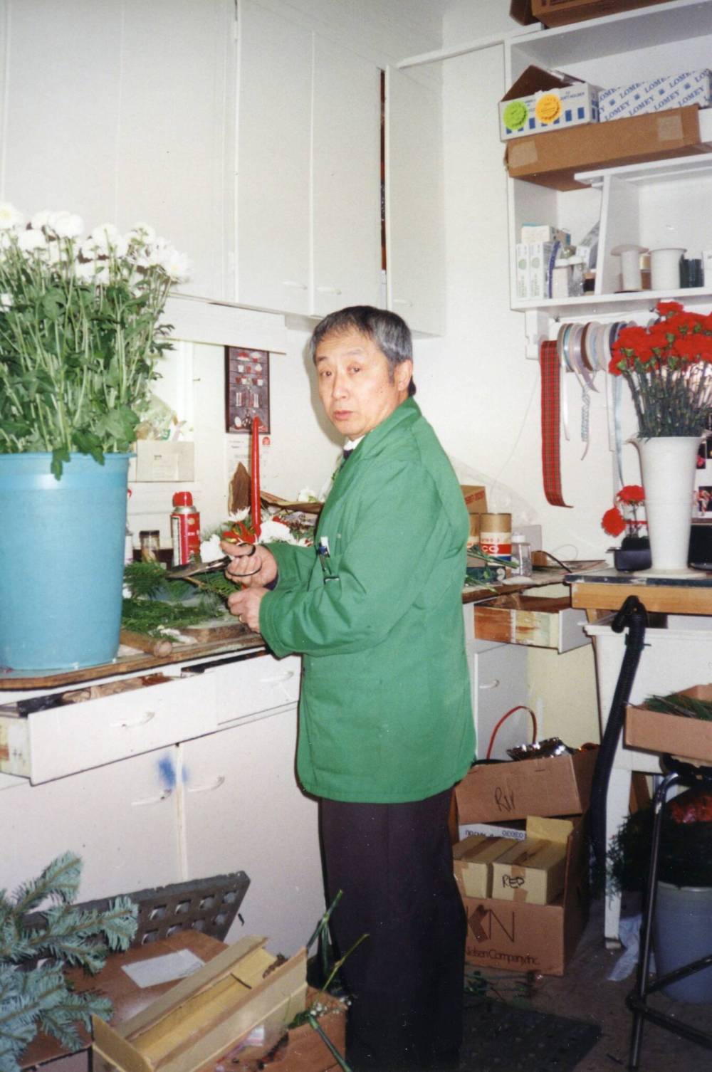 SUPPLIEDRon Kaita putting together an arrangement in the back of Roy’s Florist Shop on Notre Dame in 1980s.