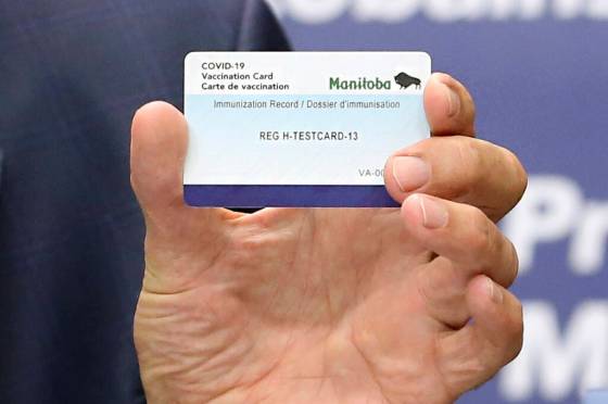 The Manitoba Immunization Card (Kevin King / Pool)