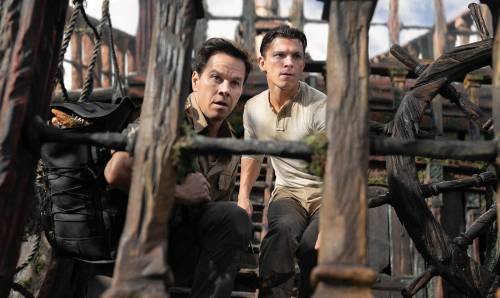 Clay Enos/Columbia Pictures
Mark Wahlberg, left, and Tom Holland search for a 16th-century gold key or a hint of thespian chemistry in Uncharted.