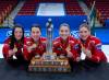 Team Canada skip Kerri Einarson, third Val Sweeting, second Shannon Birchard and lead Briane Meilleur, left to right, pose with the trophy and medals after winning the Scotties Tournament of Hearts at Fort William Gardens in Thunder Bay, Ont., Sunday, Feb. 6, 2022. Team Canada defeated Northern Ontraio 9-6. THE CANADIAN PRESS/Andrew Vaughan