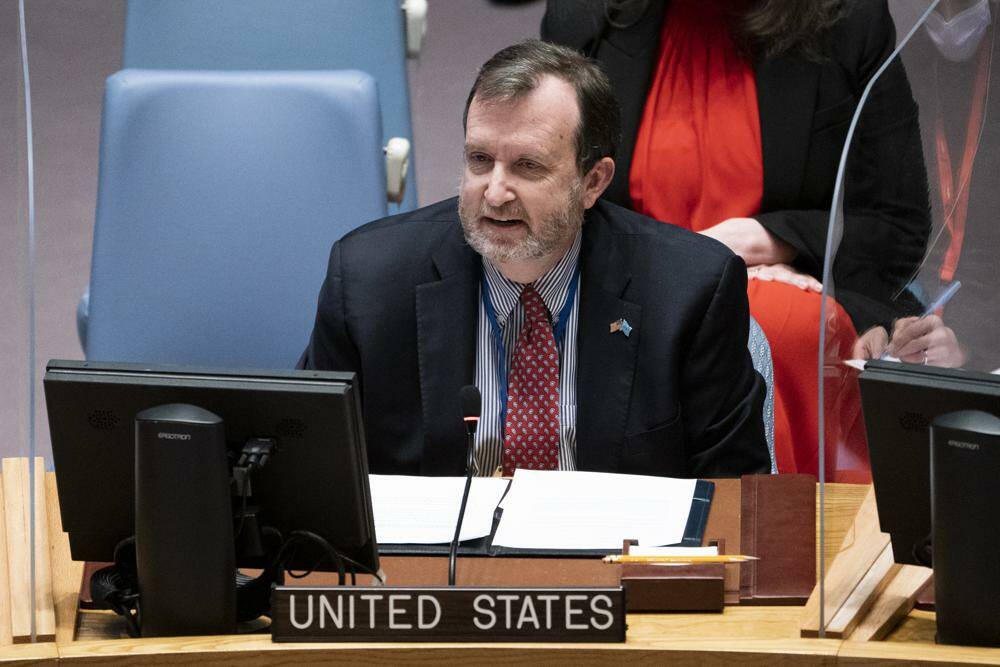 Richard M. Mills, Jr., deputy representative of the United States to the United Nations, speaks during a meeting of the security council, Monday, Feb. 28, 2022, at United Nations headquarters. (AP Photo/John Minchillo)