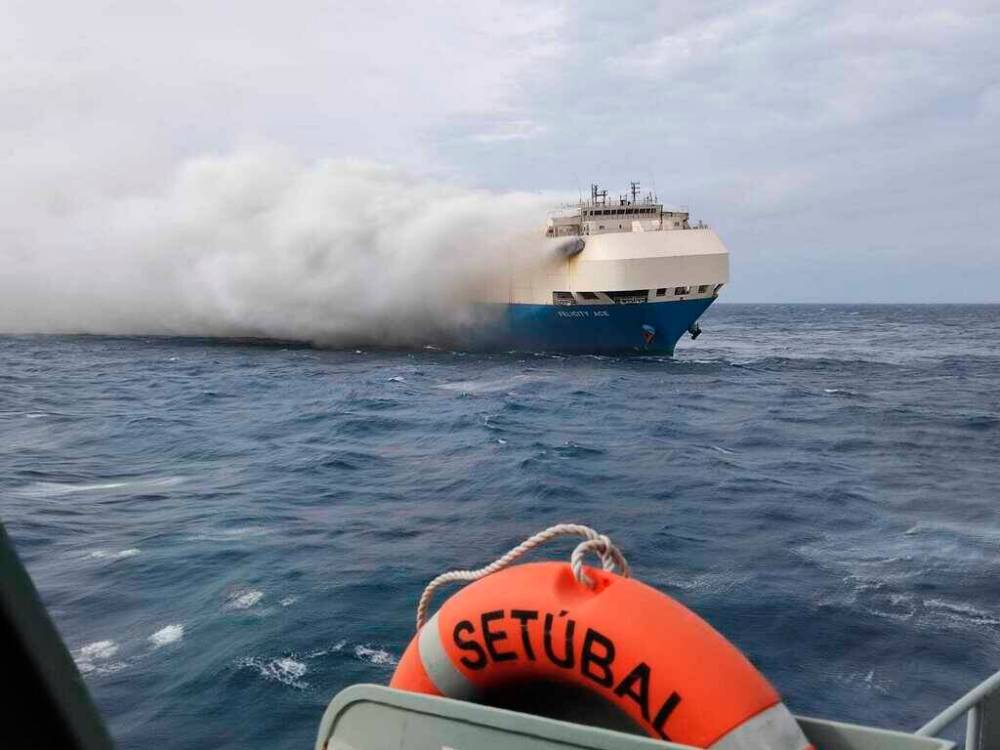 PORTUGUESE NAVY VIA ASSOCIATED PRESS
In this undated photo provided by the Portuguese Navy, smoke billows from the burning Felicity Ace car transport ship as seen from the Portuguese Navy NPR Setubal ship southeast of the mid-Atlantic Portuguese Azores Islands.