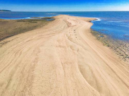 The sand is exceptional, and the water is blue — and cold. (Photos by Gord Mackintosh / Winnipeg Free Press)