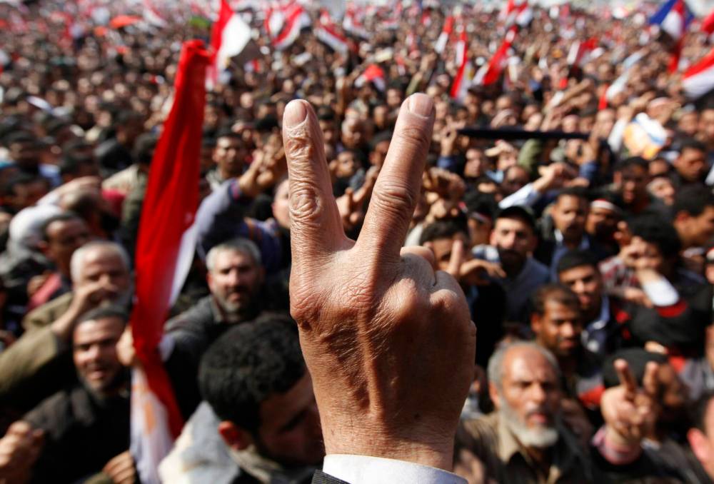 Hussein Malla / The Associated Press files
In this 2011 photo, anti-government protesters gather at Tahrir square, in Cairo, Egypt. After 18 days of protests and gatherings, pro-democracy demonstrators forced Egyptian President Hosni Mubarak from power.