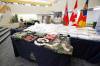 A large quantity of drugs, cash and outlaw motorcycle club patched clothing were seized as part of Project Divergent. (Erik Pindera / Winnipeg Free Press)