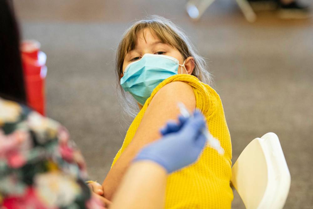 (AP)
Molly Flick, 9, gets her COVID-19 vaccine on Thursday in Barboursville, W.Va.