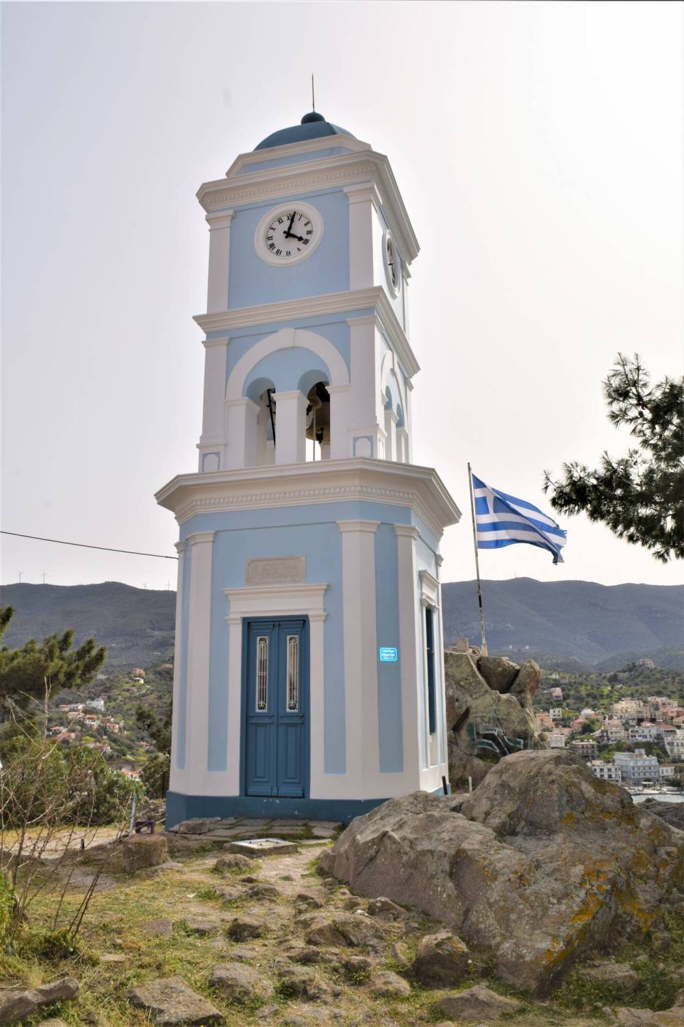 The Clock Tower rises from the hilltop on the Greek island of Poros.