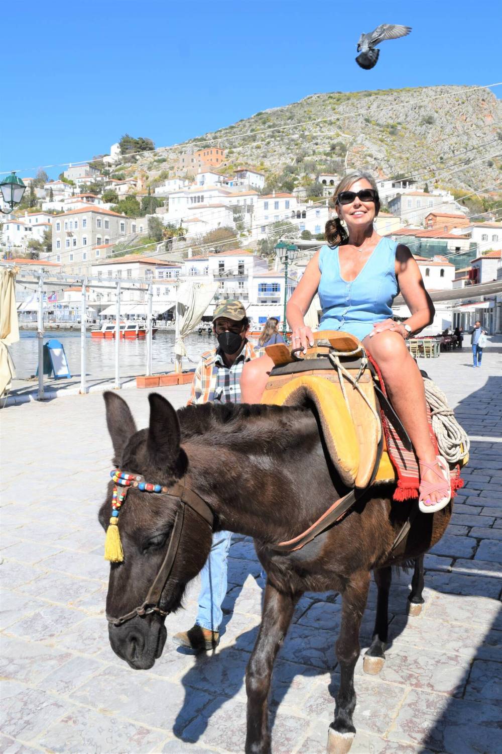 Photos by Steve MacNaull / Winnipeg Free Press
Kerry MacNaull enjoys a donkey ride through the streets on the Greek island of Hydra.