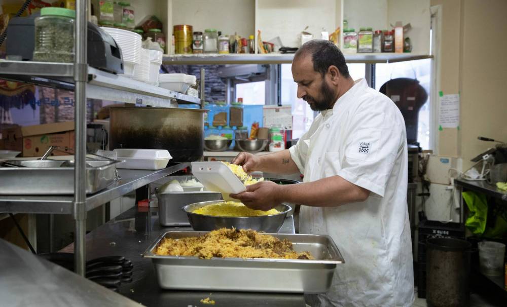 ‘I’ve been away for two years,’ says Barbeque Hut-Pakistani Grill owner Jehangir Khan, ‘and now that I’ve returned, I can’t wait to get back to doing what I do best.” (Jessica Lee / Winnipeg Free Press)